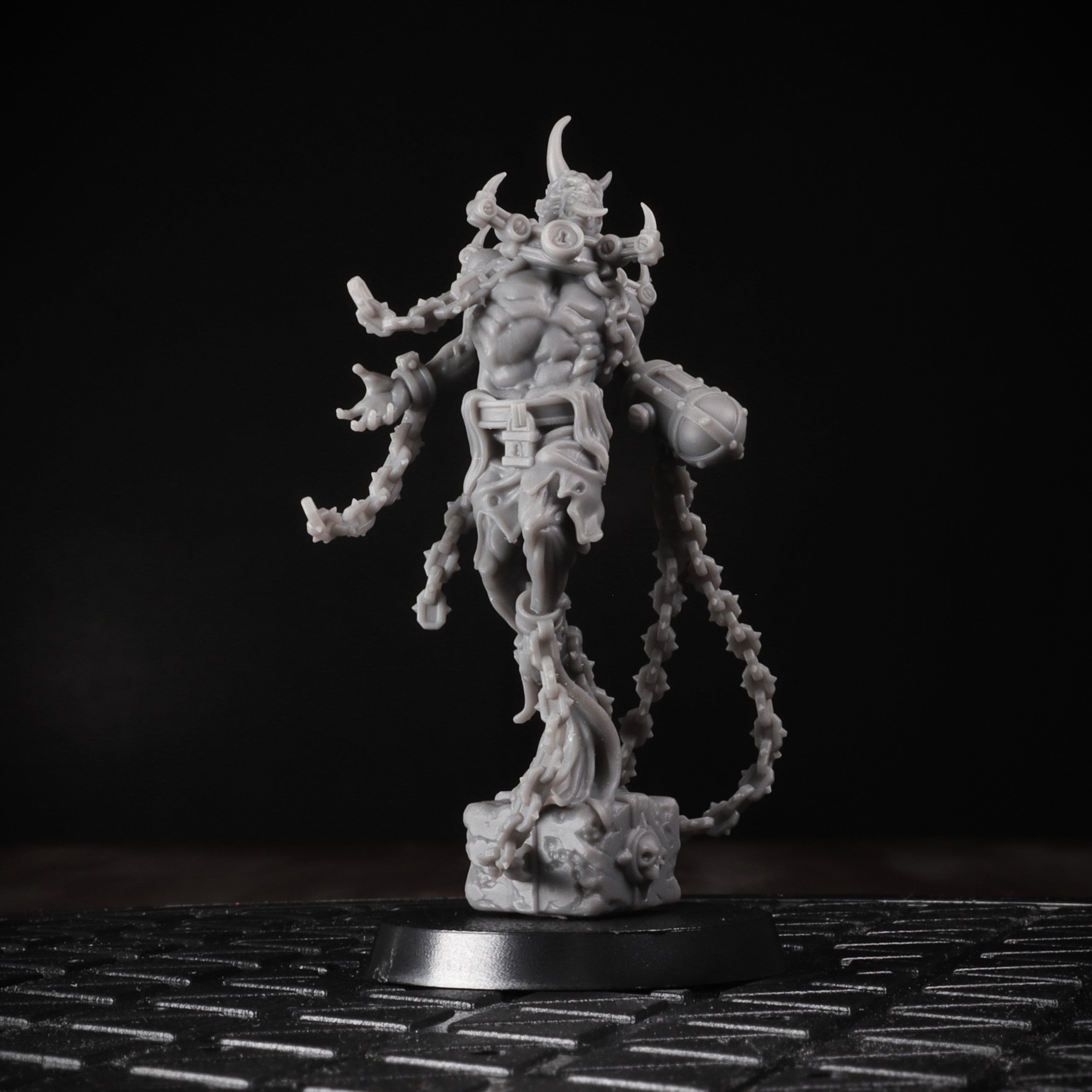 White fantasy figurine on a black background